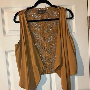 Patterson J Kincaid laser cut vest